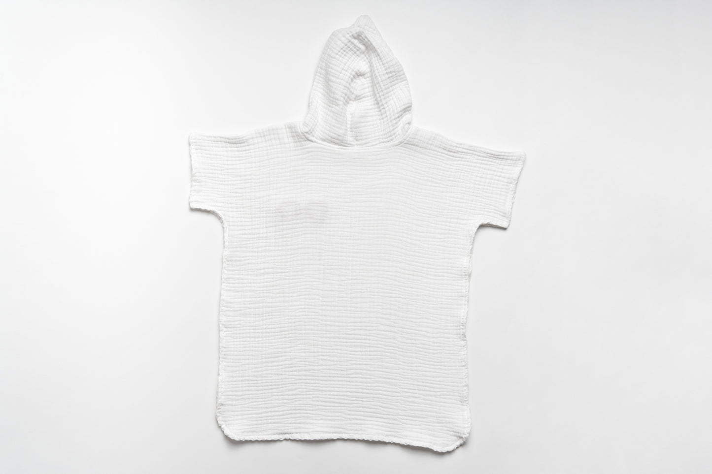 غطاء شاطئ من القماش الموسلين