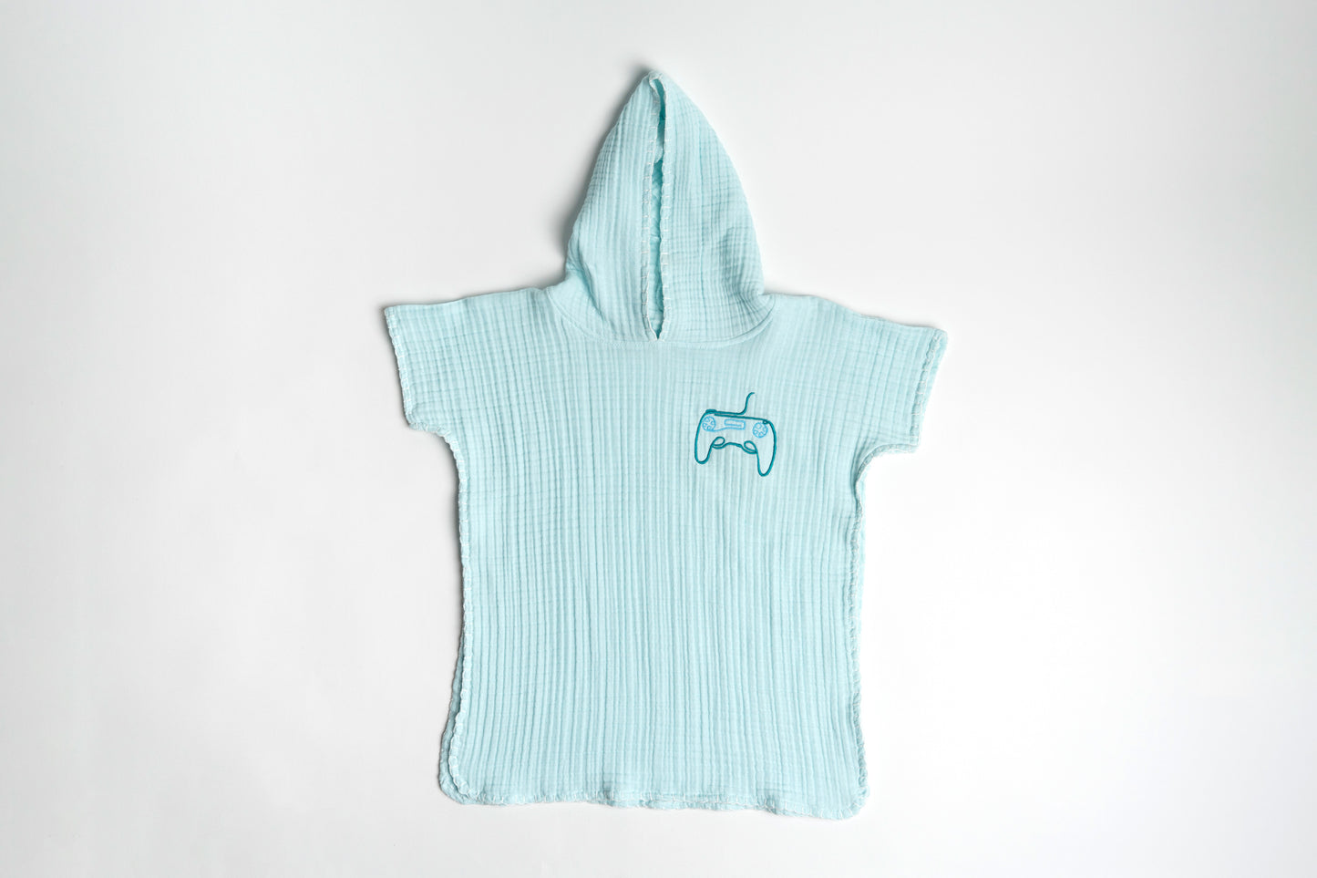 غطاء شاطئ من القماش الموسلين