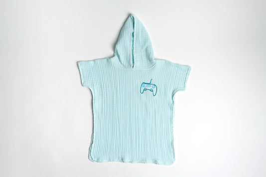 غطاء شاطئ من القماش الموسلين