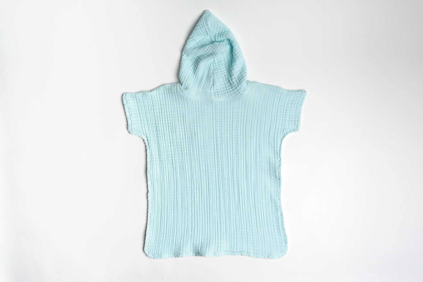 غطاء شاطئ من القماش الموسلين