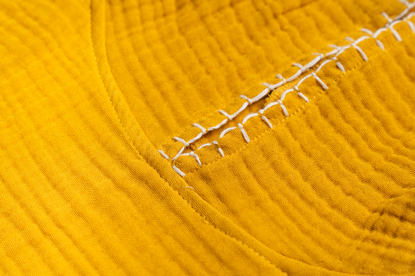 غطاء شاطئ من القماش الموسلين